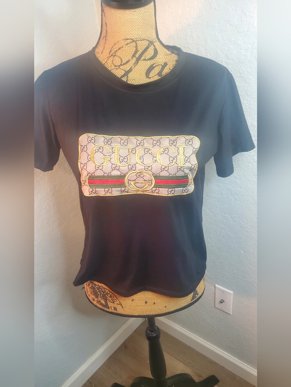 Black T-Shirt with Embroidery Patch. Very Nice Quality, No Tags In This Top.